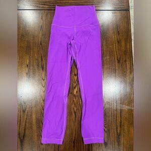 Lululemon Purple  Leggings
Good condition. Measurements are listed on photos